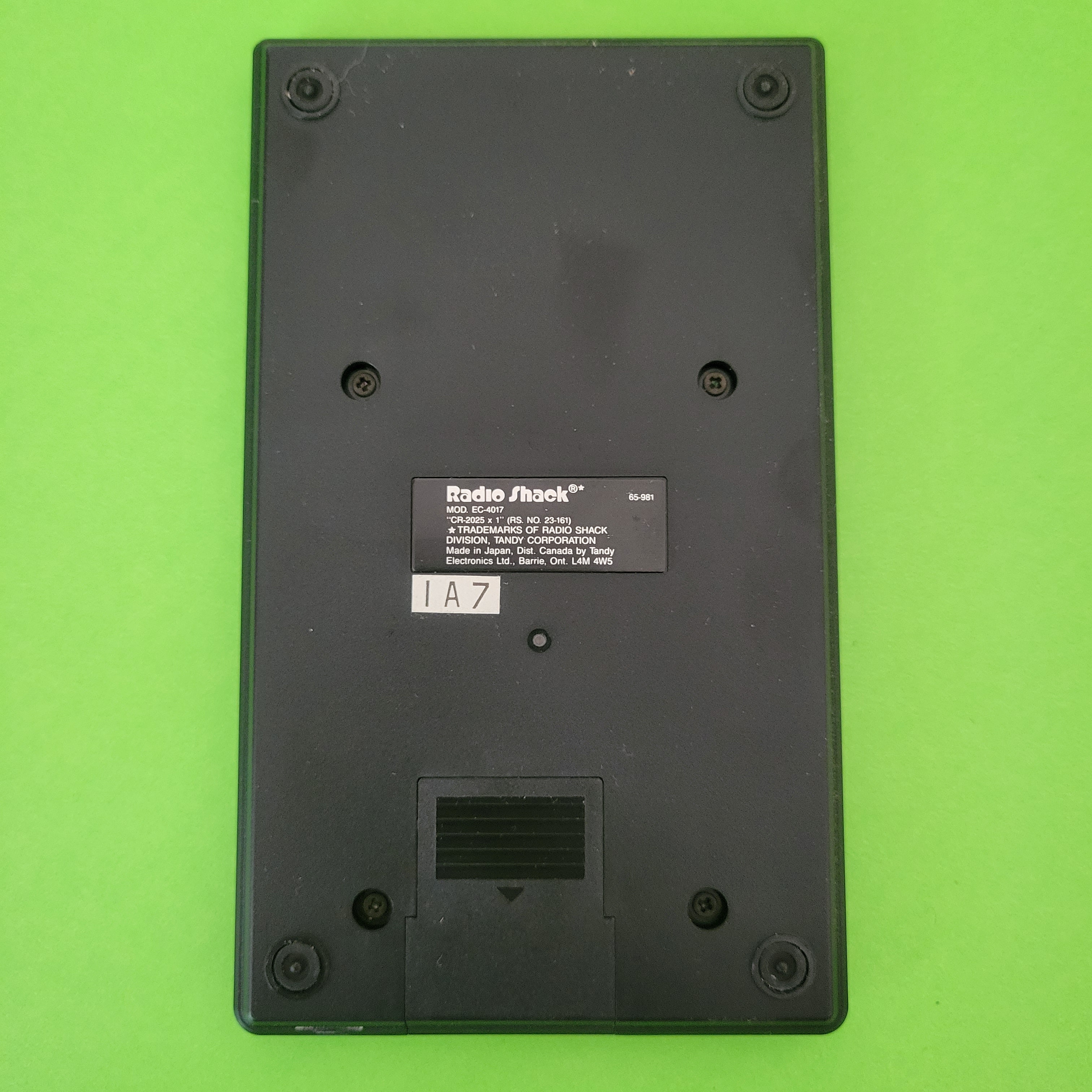 An image of the back of a Radio Shack EC-4017 Scientific/Engineering calculator
